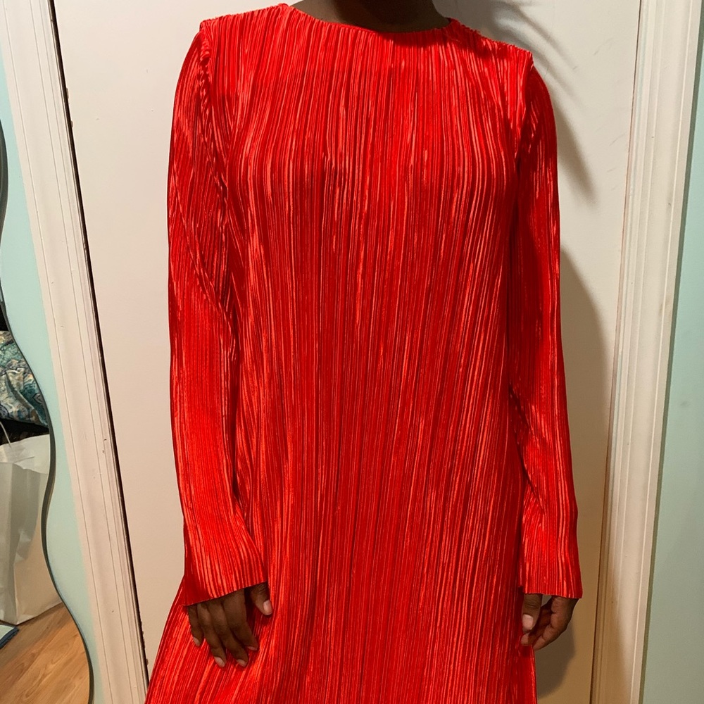 Bright red pleated dress